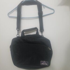 Tahitian Noni black bag with pockets